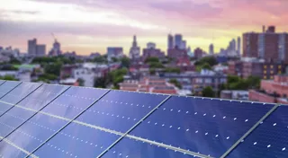 Rooftop solar overlooking a city Rooftop solar overlooking a city